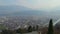 Wide panorama of big city near mountains, famous Alpine resort