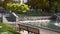 Wide panorama of the fountains on the Cascade Lake in the Shevchenko City Garden in Kharkiv on an autumn sunny day, Ukraine