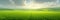 Wide panorama of lush, green fields under a sunlit sky with clouds. Realistic generative AI illustration