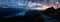 wide panorama view of mountain range during dramatic snuset from the brienzer rothorn in the swiss alps