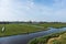 Wide panorama of Zaanse Schans Windmills. Peacefull countryside scene in Netherlands