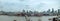 Wide panoramic aerial view of the city of london with historic landmarks and building in the business district with bridge