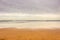 Wide panoramic beach with dramatic sky, bay of Biscay. Surf concept. Idyllic surfing day in Spain.