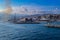 wide panoramic view of the harbor of Genoa. Blue sky blue sea white clouds and port buildings in harmony with the