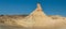 Wide panoramic view of iconic pyramid formation in Bardenas desert