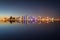 Wide panoramic view to the illuminated skyline of Doha in Qatar