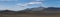 Wide panoramic volcanic lava desert landscape with view on Tindfjallajokull glacier mountain peak, Landmannalaugar mountain and