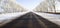 Wide paved winter road