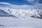 A wide piste, on a clear sunny day in Meribel, in the French Alps