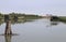 Wide river and the stilts houses with fishing nets for fishing