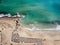 Wide sandy coastline, long sea waves of Falasarna beach Crete, Greece