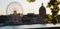 Wide shot of a ferries wheel near buildings in Toulouse France