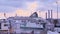 Wide shot of a ferry moving away from a dock