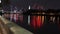 Wide shot of a glowing Albert Bridge in London with beautiful lights from the buildings