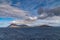 Wide shot of Hornos island under cloudscape, Cape Horn, Chile