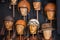 Wide shot of mannequin heads with aviator hats