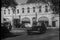 Wide shot of police car chase on San Fernando street, 1940s