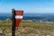 A wide shot of a sign PanorÃ¢mica do Detrelo da Malhada, Arouca, Portugal