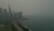 Wide shot of Smoky Air From Canadian Wildfires Blankets Midwestern Skies Chicago