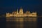 Wide static shot of the Hungarian parliament at night