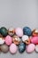 A wide strip of many multicolored eggs. Easter minimalistic concept, place for your text