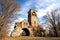 Wide three quarter view of the historic Mohonk Testimonial Gateway. The stone gatehouse was