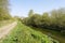 Wide treelined footpath high above the River Idle