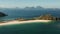 Wide tropical beach with white sand, view from above.