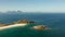 Wide tropical beach with white sand, view from above.