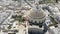 A wide view, aerial 4k drone footage, circling the Mosta Rotunda Dome, a Roman Catholic church.