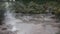 Wide view of a boiling mud pool