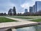 Wide view of families enjoying walking and biking around the circular ring of Bellevue Downtown Park