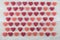 Wide View Grid of Dark Red and Pink Gummy Hearts