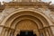 Wide view of romanesque archivolts and tympanum in San isidoro