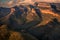 Wide view of the Three Rondavels and surrounding mountain cliffs