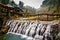 Wide waterfall with motion blur from the streaming water in the valley of Sapa