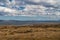 Wide windswept landscape under spectacular cloudscape on Falklands, UK