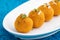 Widely Popular Motichur Laddu Also Called Motichoor Ladoo Is Sweet Mithai Decorated In White Tray. Meetha Laddoo Deep Fried In