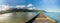 Widescreen panorama of Hanalei Bay and Pier on Kauai Hawaii