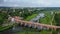 The Widest Waterfall in Europe in Latvia Kuldiga and Brick Bridge Across the River Venta in the Evening After Sunrise