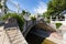 Wienfluss Vienna River flowing under the bridge at Stadtpark, City Park in Vienna, Austria during summer