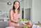 Wife, healthy food and salad while serving lunch or supper for husband with a smile at home. Caring and happy housewife