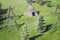 Wigwam type thatch huts in native american camp site.Wigwam type thatch huts .Straw wigwam on a glade on a sunny spring day