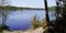 Wild beach access with water Lake of Hostens in Gironde france in panoramic header view