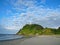 Wild beach and lighthouse at Ilha do Mel (Honey Island) near Cur