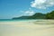 Wild Beach Shallow Sand Coral Sea Mountains Tropical Landscape