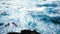 Wild blue sea-white sea foam-tidal waves crushing