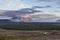 Wild camping in Iceland green hills with mountain.