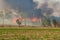 Wild fires that are spreading to sugarcane of farmers fields and have the large smoke groups