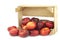 wild flat nectarines in a wooden crateelons